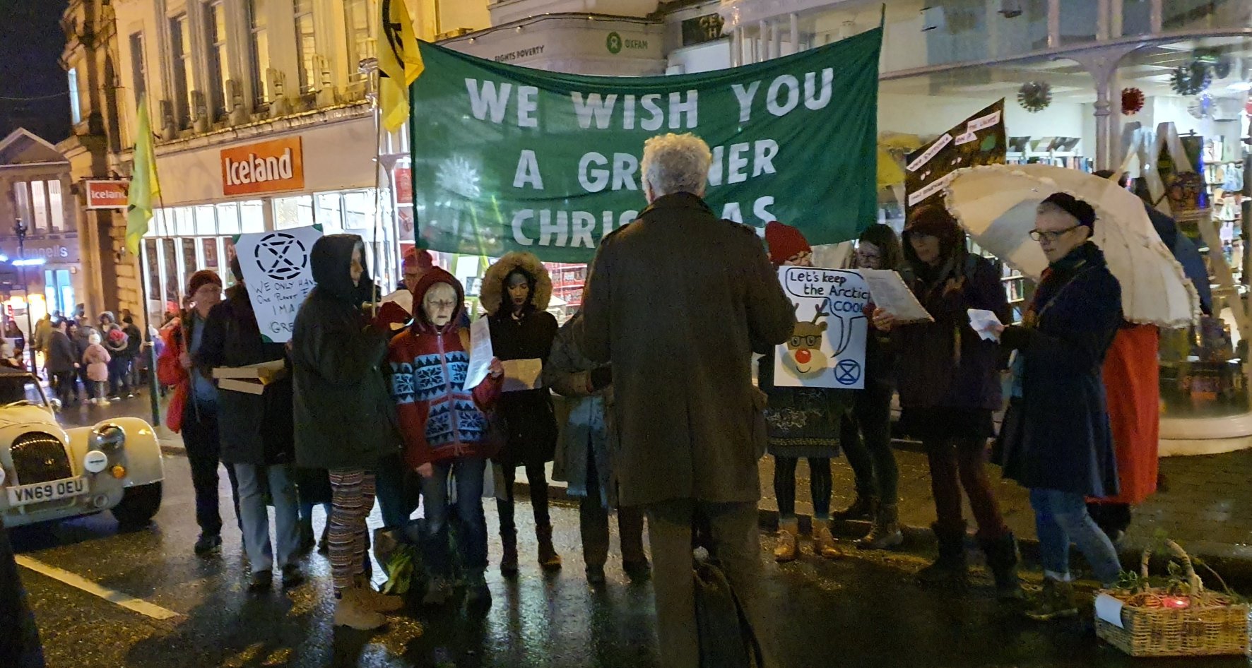 Christmas carolling at the Malvern lights switch on Extinction